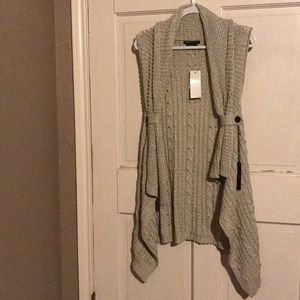 White glittery sleeveless cardigan